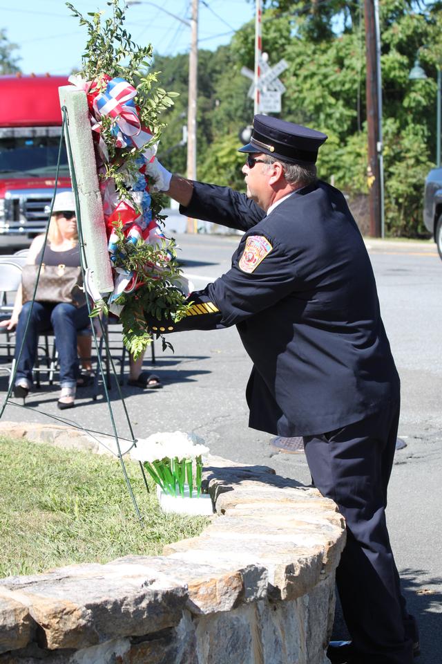 Flower placed for members from 1920 to 2012 by Harold Straut.

Memorial Service NFD. September 9, 2012. Photo by Vincent P. Tuzzolino